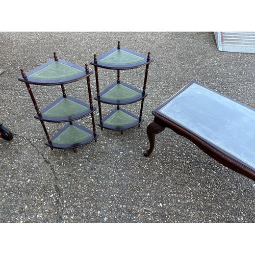 55 - A repro mahogany coffee table, two corner whatnots and an oriental table