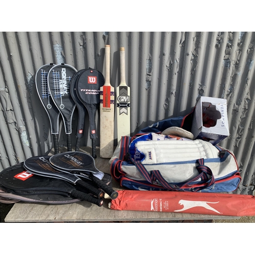 507 - Cricketing Items including pads, bats, box of balls and stumps plus badminton & tennis rackets (4)