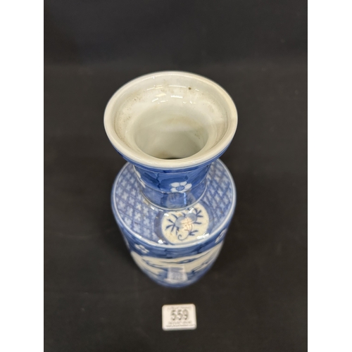 559 - Oriental blue and white Dog of Foe vase, height 26cms
