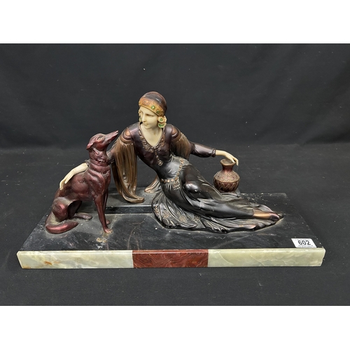 602 - Art Deco Lady & Dog Figure, on heavy marble base, length 58 cms, width 21 cms