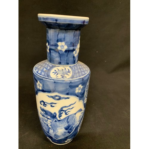 559 - Oriental blue and white Dog of Foe vase, height 26cms