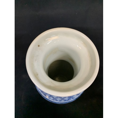 559 - Oriental blue and white Dog of Foe vase, height 26cms