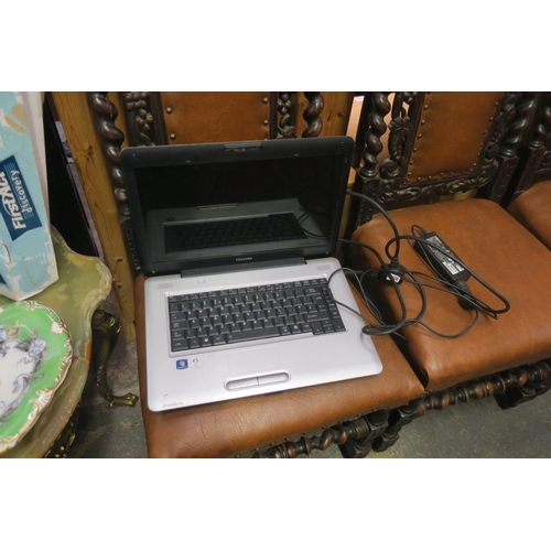 1606 - TOSHIBA LAPTOP AND CHARGER - SPARES