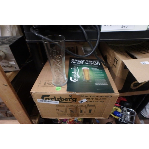 89 - BOX OF 24 CARLSBERG PUB PINT GLASSES