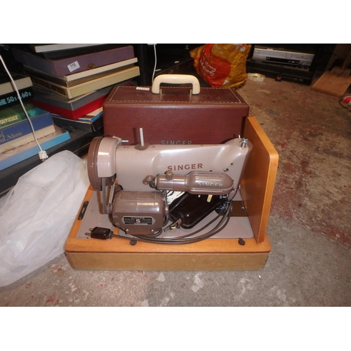 127 - SEWING MACHINE IN CASE