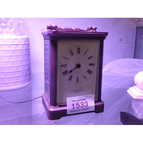 1533 - MAPPIN & WEBB LONDON BRASS COLOURED CARRIAGE CLOCK , WITH GLASS SIDES , MECHINISM VISABLE. VERY HEAV... 