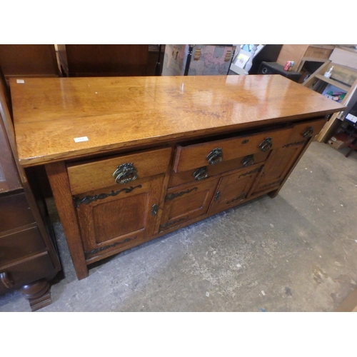 661 - LARGE ANTIQUE OAK SIDEBOARD WITH BRASS FIXINGS