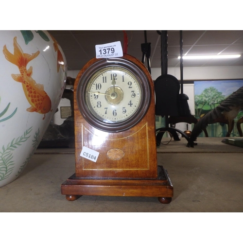 1379 - SMALL WOODEN MANTLE CLOCK WITH MARQUETRY INLAY