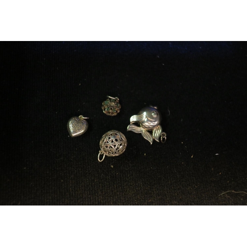 1578 - 4 STERLING SILVER PENDANTS - FISH, HEART, BALL AND FLOWER WITH GREEN STONES