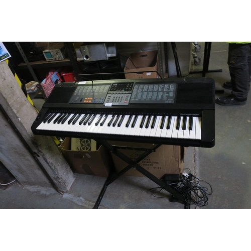 538 - CASIO CTK/750 ELECTRONIC KEYBOARD AND STAND