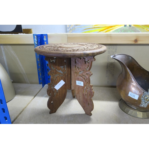 1127 - A SMALL WOOD CARVED MOORISH TABLE WITH INLAID TOP