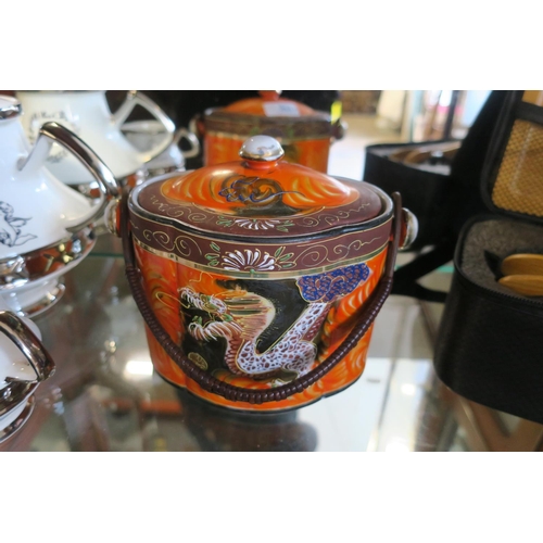 1325 - A SAMURAI CHINA BISCUIT BARREL WITH LID