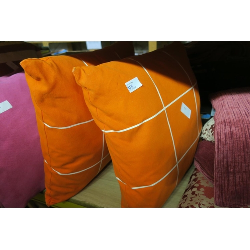 610 - TWO ORANGE CUSHIONS