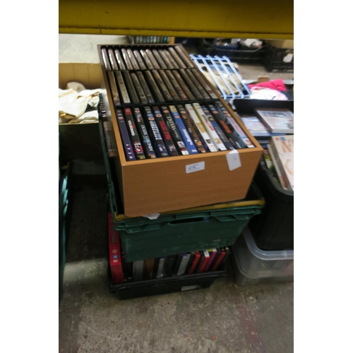 579 - TWO CRATES AND A BOX OF DVDS AND CASES