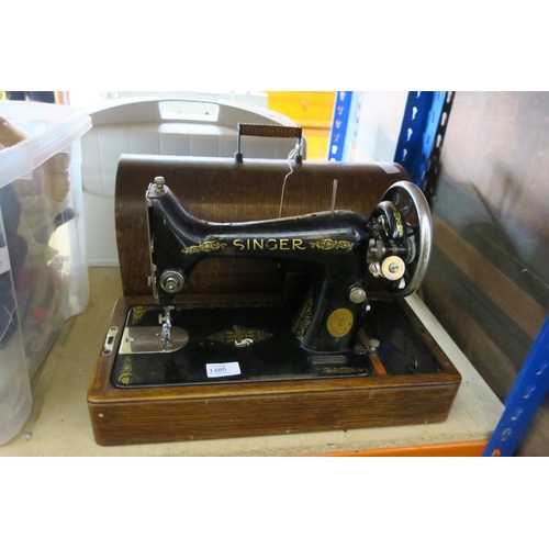 1405 - A MANUALLY OPERATED SINGER SEWING MACHINE Y2307656