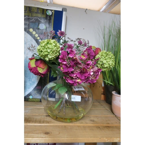 425 - GLASS VASE WITH ORNIMENTAL FLOWERS IN FAUX WATER