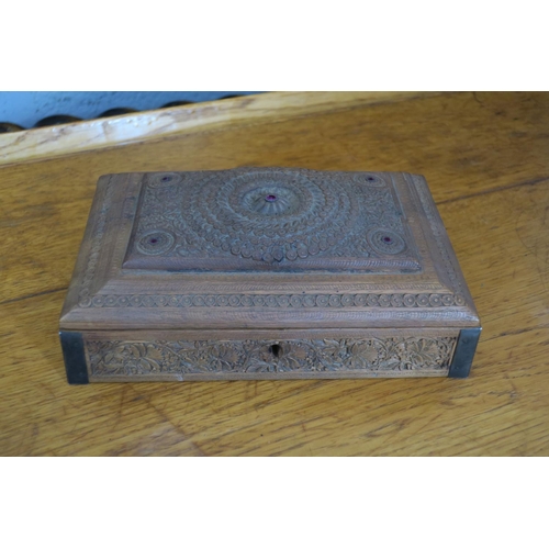 1219 - SMALL INTRICATELY CARVED BOX WITH SILVER EDGING AND INITIALLED PLATE INSIDE