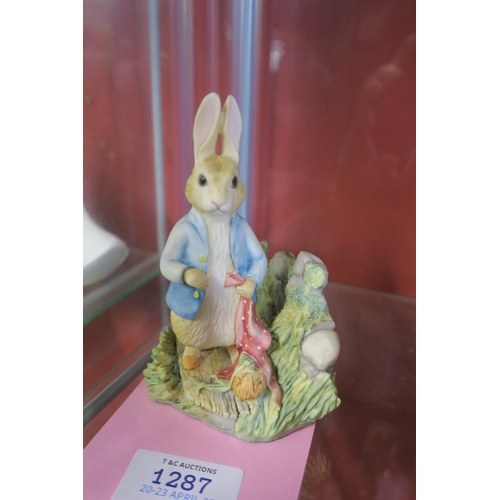 1287 - BEATRIX POTTER FIGURINE - 'PETER IN THE GARDEN' BY BORDER FINE ARTS