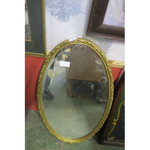 1329 - OVAL GILT FRAMED MIRROR