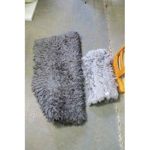 608 - LARGE GREY LONG PILE RUG AND SMALL ONE