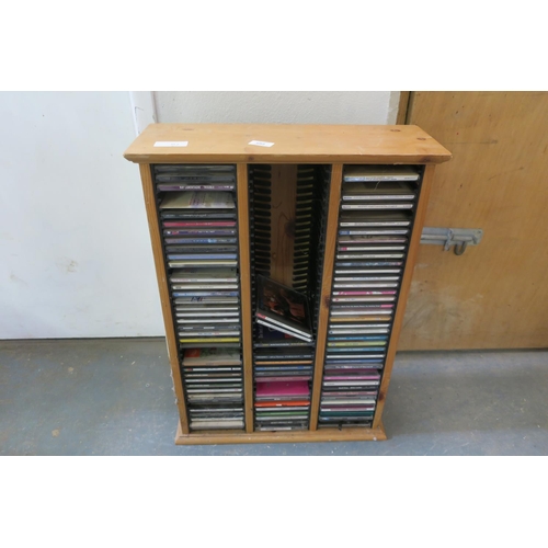 652 - PINE CD STORAGE UNIT AND CD'S