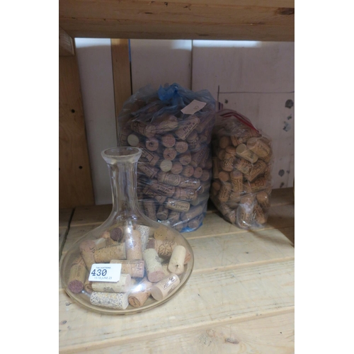 430 - DECANTER OF CORKS WITH 2 BAGS OF CORKS