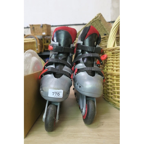 776 - PAIR OF ROLLER BLADES SIZE 6