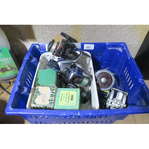 263 - BOX OF FISHING REELS AND SPOOLS