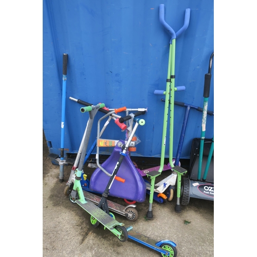 65 - BUNDLE OF CHILDRENS TOYS, SCOOTERS, STILTS ETC