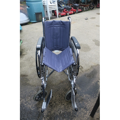 67 - FOLDING WHEELCHAIR