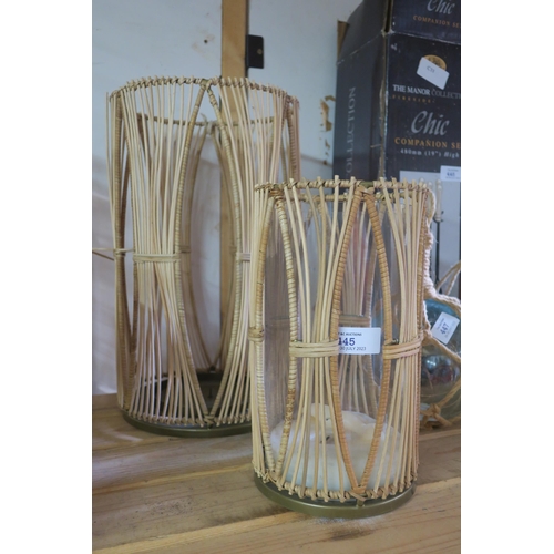 445 - 2 WICKER CANDLE HOLDERS - ONE WITH GLASS INSERT