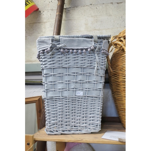 673 - GREY WICKER LAUNDRY BASKET