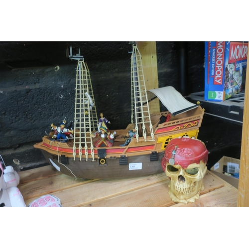 730 - PIRATE SHIP, FIGURES AND SKULL