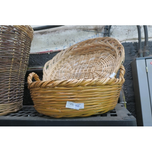 753 - A ROUND AND AN OVAL BASKET