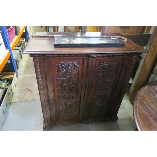 1127 - HEAVILY CARVED VICTORIAN CUPBOARD