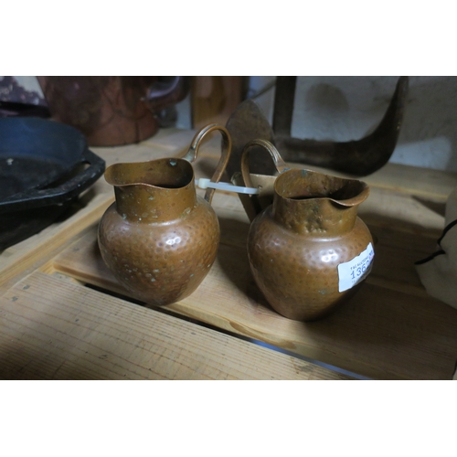 1362 - PAIR OF SMALL HAND BEATEN COPPER JUGS