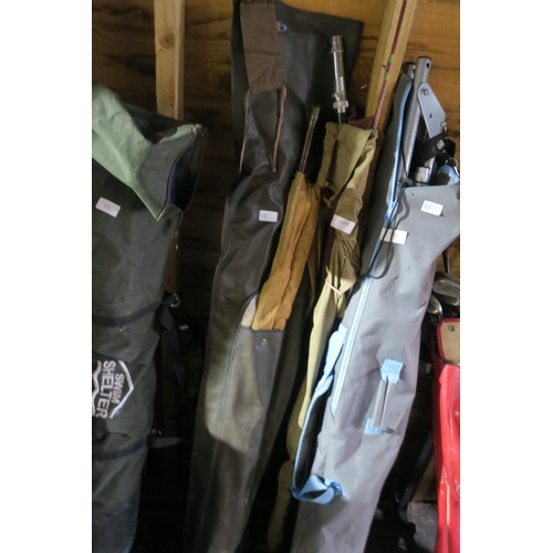 430 - VINTAGE FISHING RODS IN BAGS