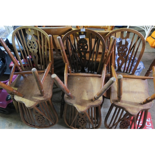 439 - SIX VINTAGE WHEEL-BACK DINING CHAIRS