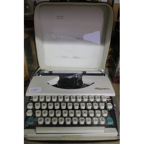 1198 - VINTAGE OLYMPIA TYPEWRITER IN TRADITIONAL BLACK LEATHER CARRY CASE