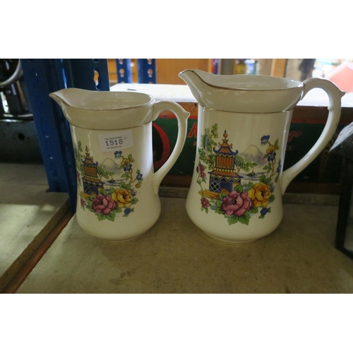 1518 - TWO MID-CENTURY PITCHERS WITH ORIENTAL GARDEN MOTIF