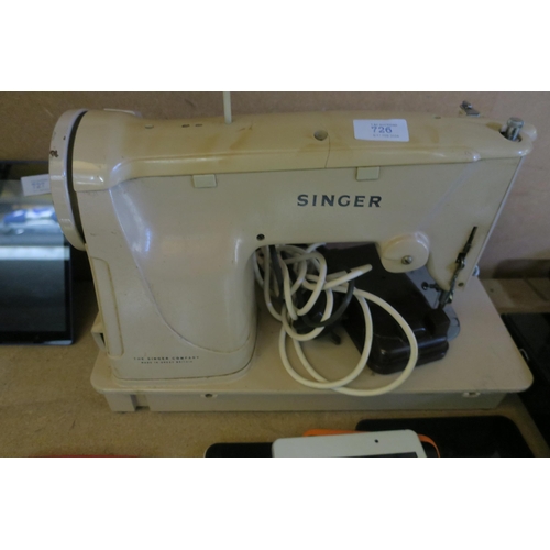 726 - SINGER SEWING MACHINE AND PEDDLE