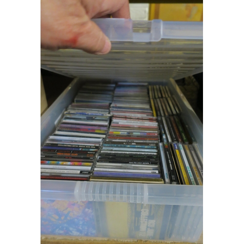 1050 - A TUB OF VARIOUS CDS AND CASES