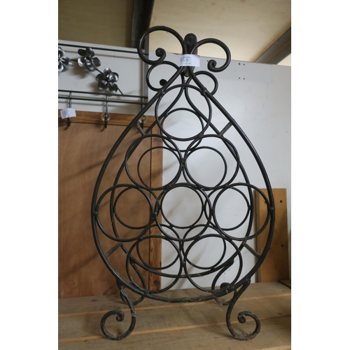 510 - TEAR DROP SHAPED IRON WINE RACK