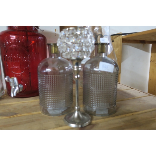 543 - TWO BOTTLE CANDLE HOLDERS AND A TEA LIGHT HOLDER