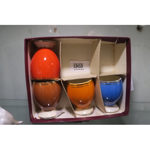 1303 - SET OF FOUR COLOURED VINTAGE EGG CUPS