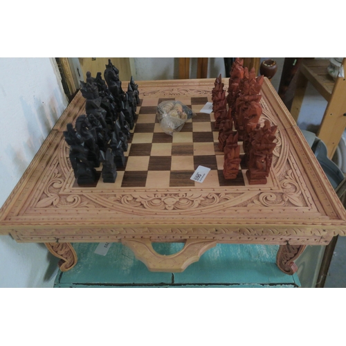 1195 - UNUSUAL AFRICAN CARVED CHESS BOARD WITH AFRICAN PAWNS/ALSO DOUBLES TO PLAT BACK GAMMON ON THE REVERS... 