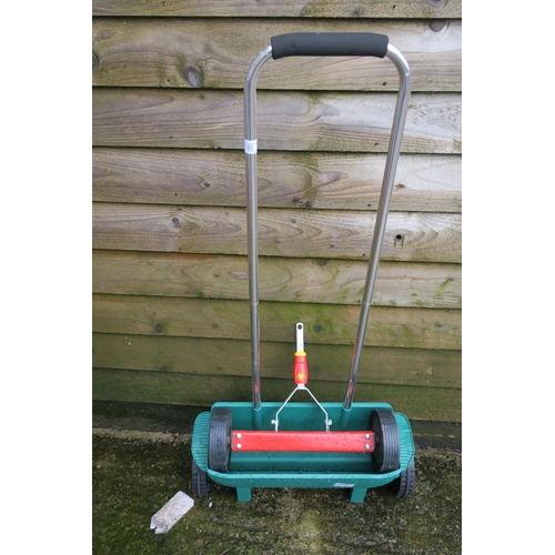 22 - GARDEN SEEDER AND WOLF TOOL