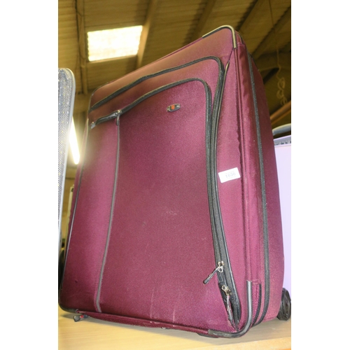 1636 - A LARGE BURGANDY SHELL SUITCASE