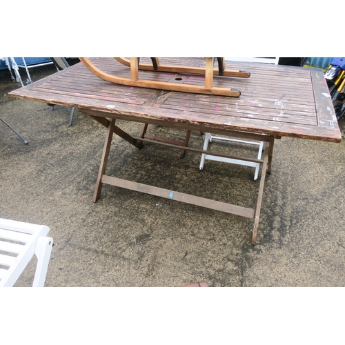 64 - WOODEN GARDEN TABLE