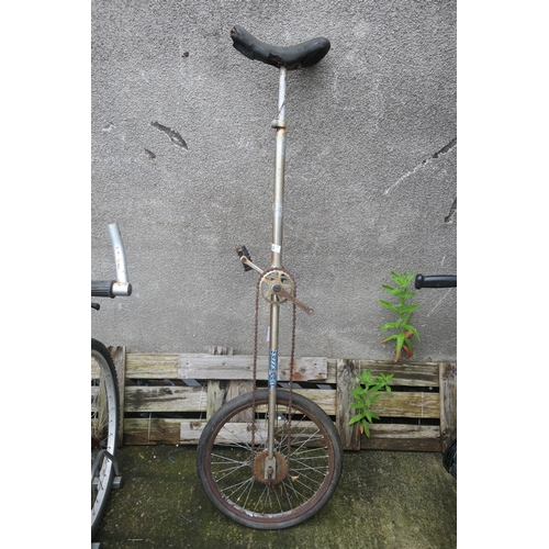 18 - VERY TALL UNICYCLE